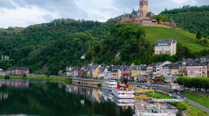 A castle overlooking a village and river in Germany