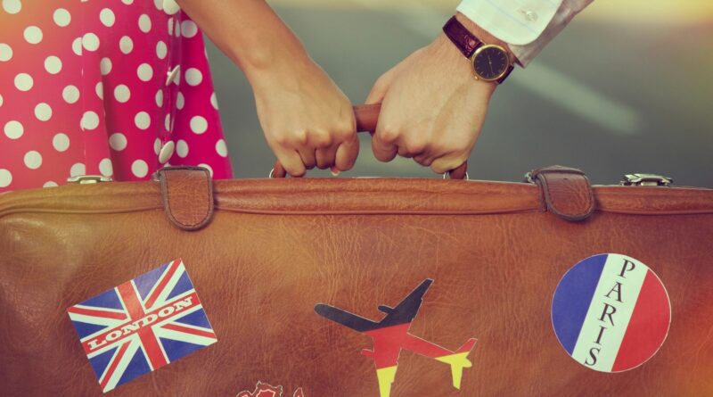 A suitcase with stickers