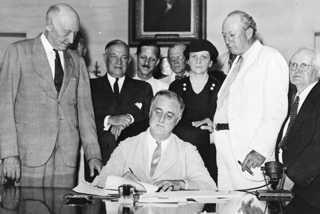 FDR signing the Social Security Act