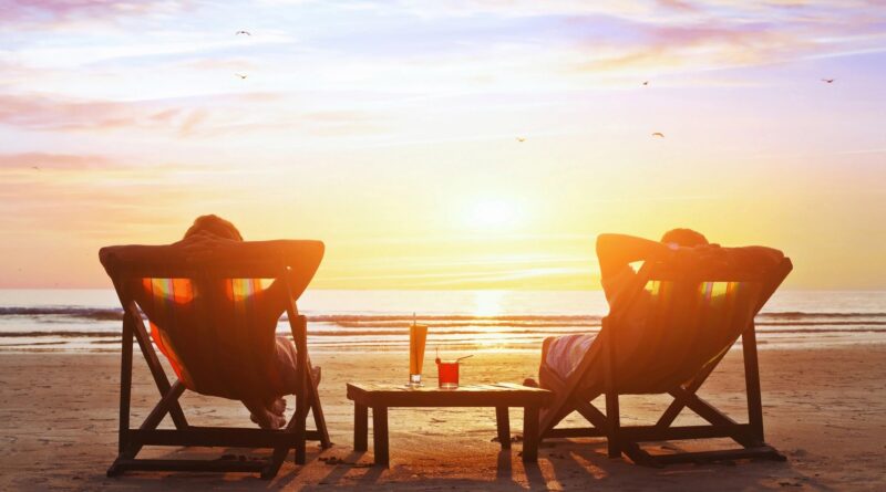 Two people watching the sunset