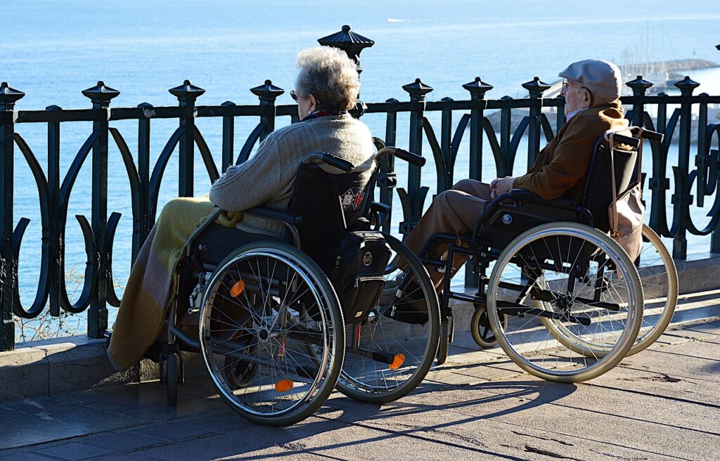 senior couple in wheelchairs