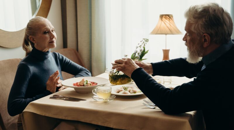 older couple eating at restaurant