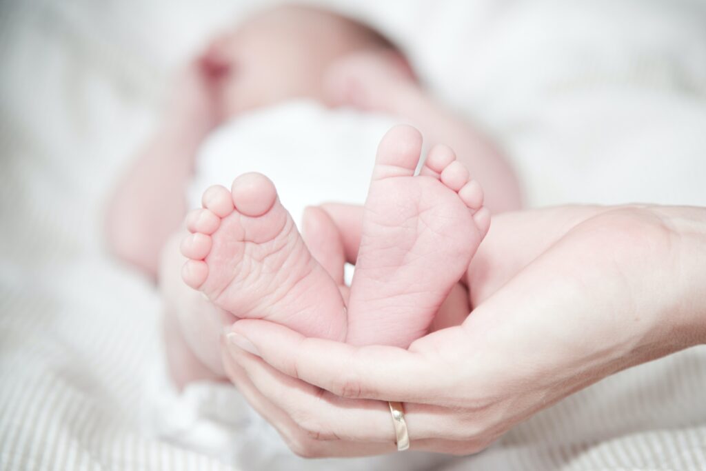 hand holding baby's feet