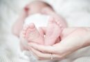 hand holding baby's feet