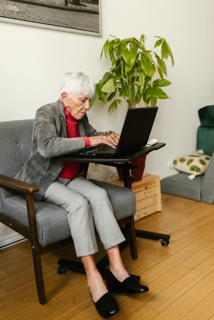 older woman using laptop