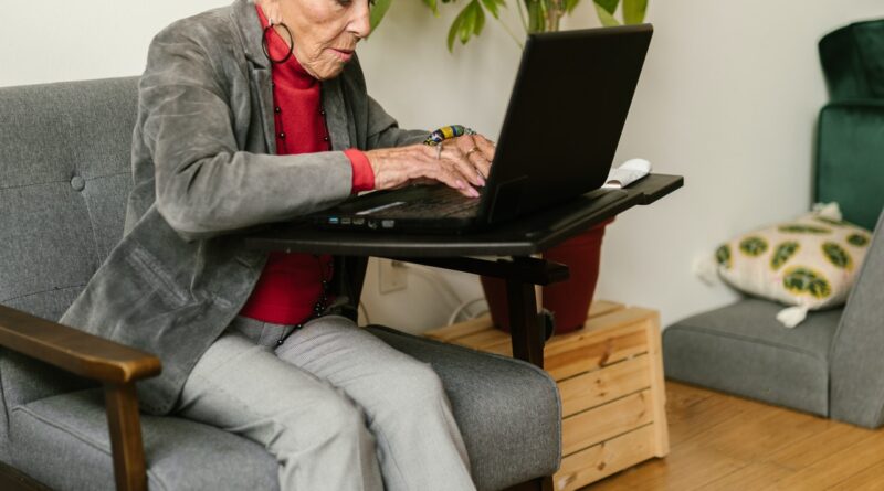 older woman using laptop