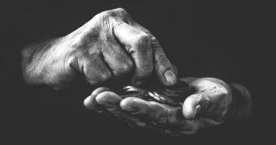 old hands with coins