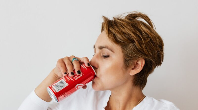 woman drinking soda