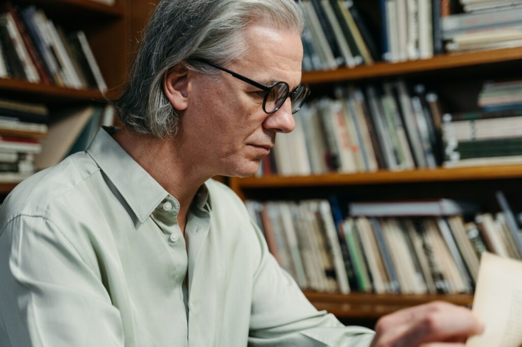 man in library