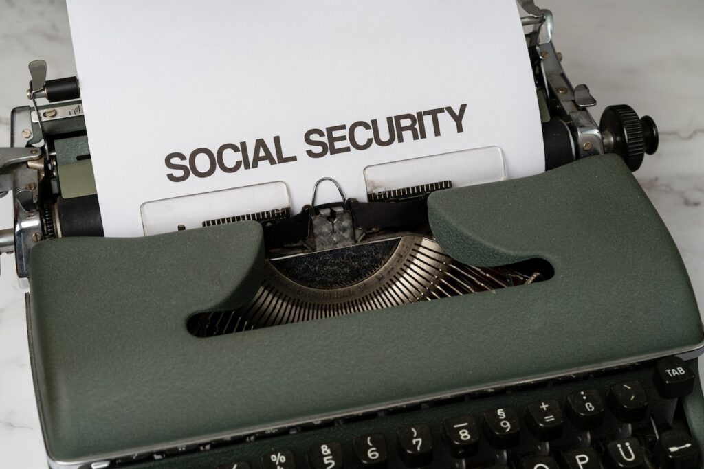 typewriter with Social Security on page