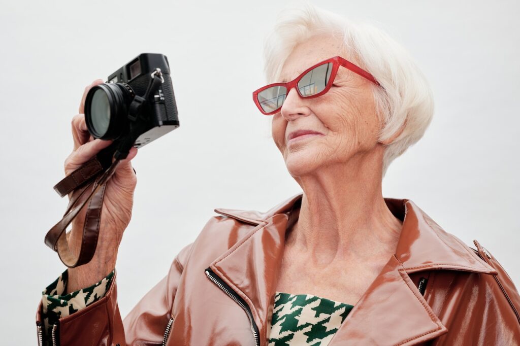 senior woman with camera