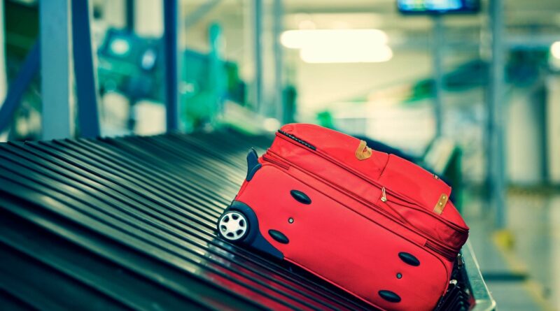 suitcase on baggage carousel