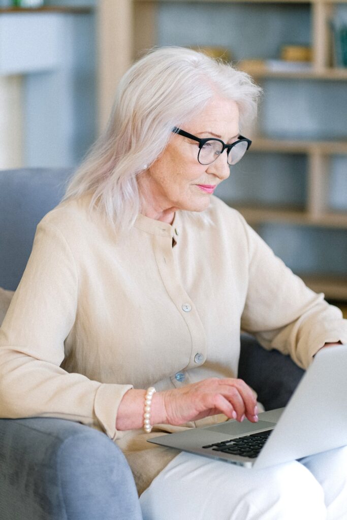 senior woman using laptop