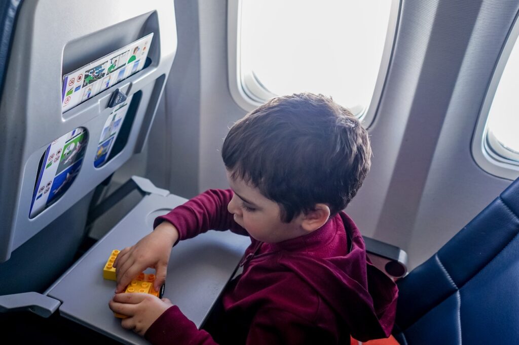 boy passenger on plane