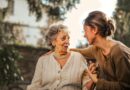 woman comforting elderly woman