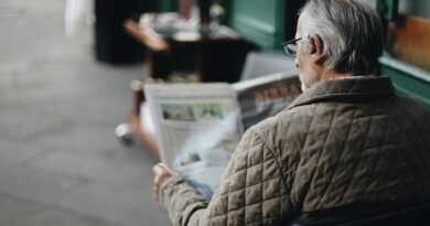 man reading newspaper